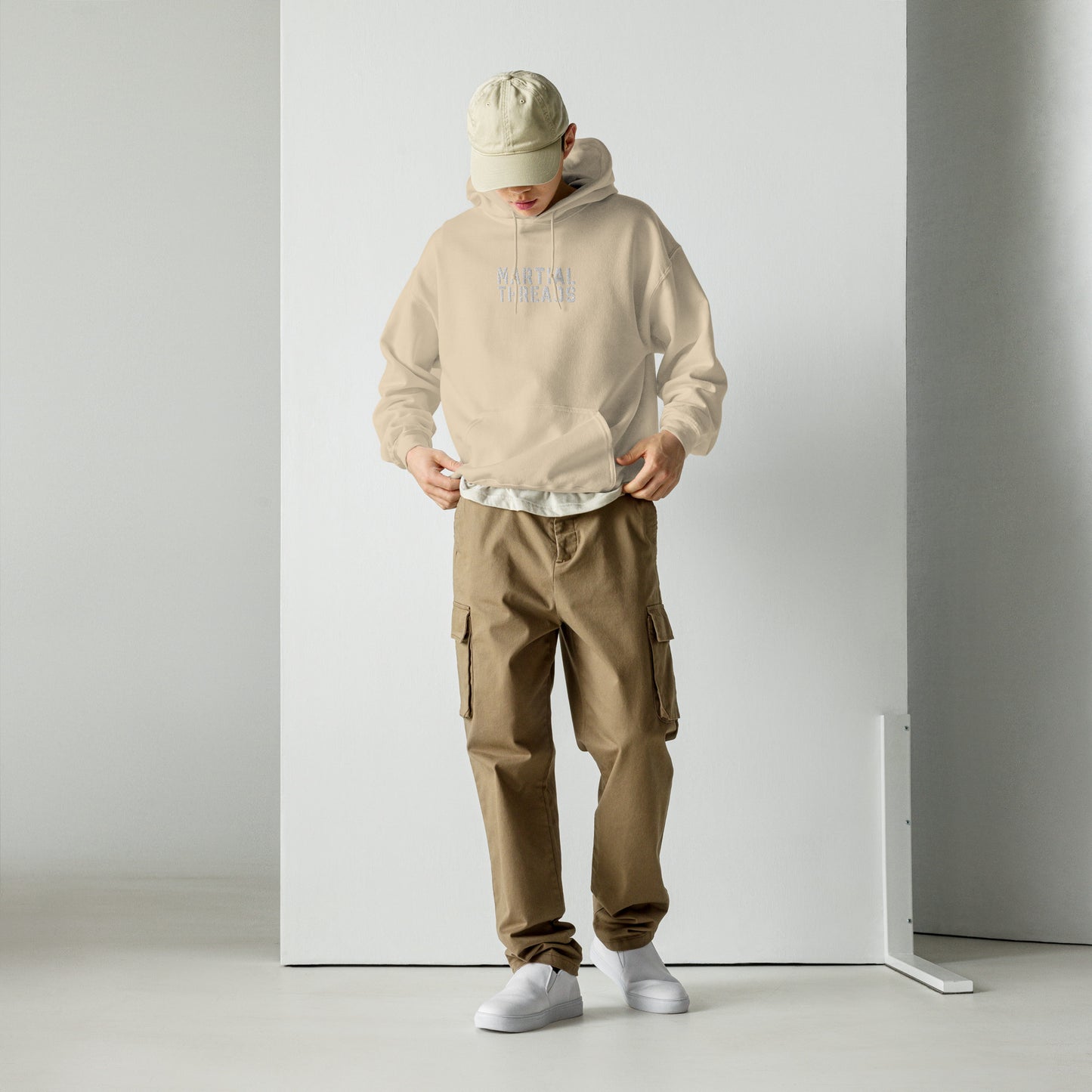 La sudadera con capucha marcial